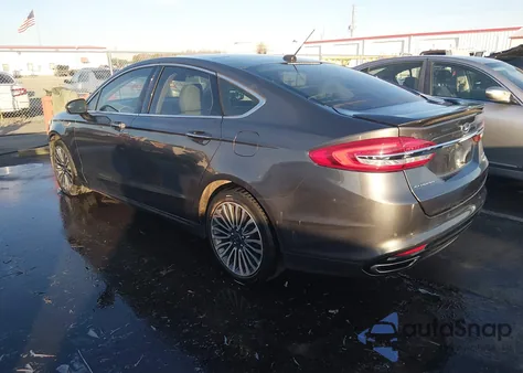 2018 Ford Fusion Titanium z USA, uszkodzony, nr VIN 3FA6P0D9XJR188547